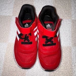 Boys Red Adidas tennis shoes